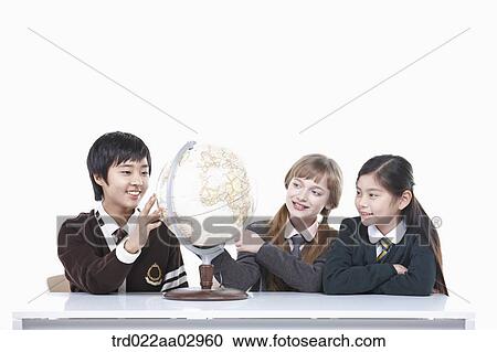 The global students looking at the globe View Large Photo Image Stock Image - The global students looking at the globe. Fotosearch
