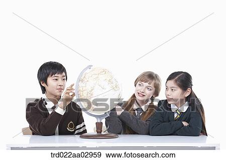 The global students looking at the globe View Large Photo Image Stock Photo - The global students looking at the globe. Fotosearch
