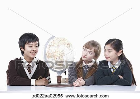 The global students looking at the globe View Large Photo Image Stock Photography - The global students looking at the globe. Fotosearch