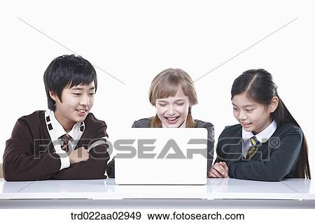 The global students looking at the laptop View Large Photo Image Stock Photo - The global students looking at the laptop . Fotosearch
