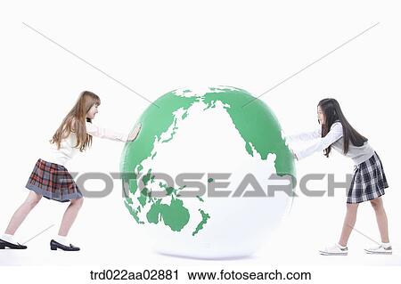 The global students pushing the globe View Large Photo Image Stock Image - The global students pushing the globe. Fotosearch