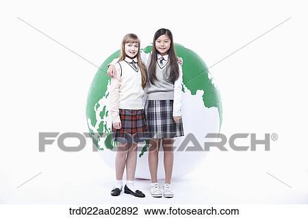 Stock Image - The global students putting their arms around each other. Fotosearch