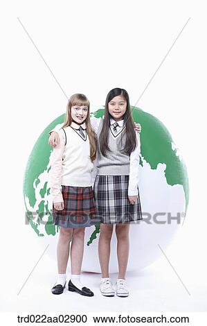 Stock Image - The global students putting their arms around each other. Fotosearch