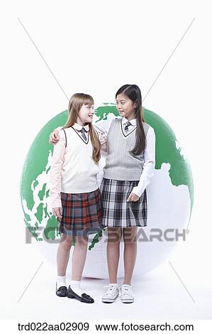 Stock Photo - The global students putting their arms around each other. Fotosearch