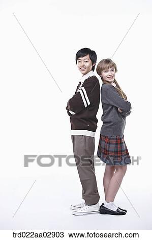 Stock Image - The global students standing against each other. Fotosearch