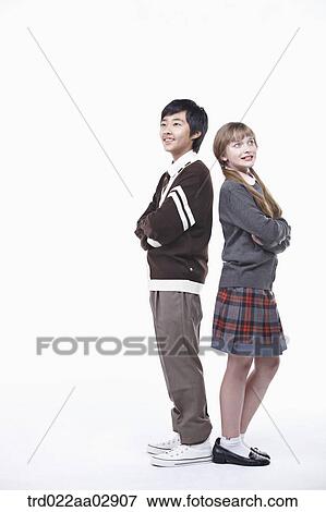 Stock Photo - The global students standing against each other. Fotosearch
