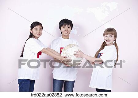 The global students with the globe View Large Photo Image Stock Image - The global students with the globe. Fotosearch