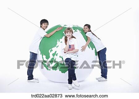The global students with the globe View Large Photo Image Stock Image - The global students with the globe. Fotosearch