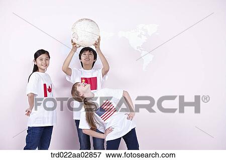 The global students with the globe View Large Photo Image Stock Photo - The global students with the globe. Fotosearch
