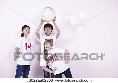 The global students with the globe View Large Photo Image Stock Photograph - The global students with the globe. Fotosearch