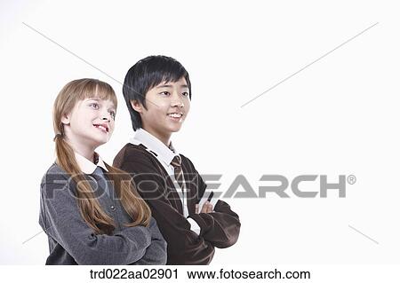 Stock Image - The global students with their arms folded. Fotosearch
