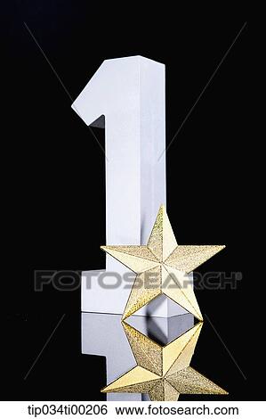 The gold star and number one View Large Photo Image Stock Photograph - The gold star and number one. Fotosearch