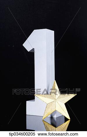 The gold star and number one View Large Photo Image Stock Photography - The gold star and number one. Fotosearch