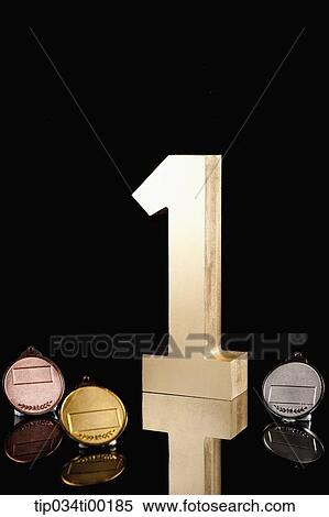 The golden number one and prize medal View Large Photo Image Stock Photography - The golden number one and prize medal. Fotosearch