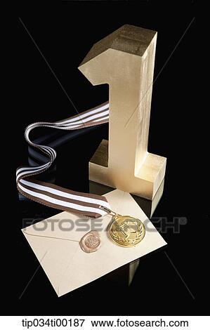 The golden number one, prize medal, and letter of certificate View Large Photo Image Stock Photo - The golden number one, prize medal, and letter of certificate. Fotosearch