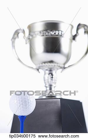 Stock Photography - The golf ball and trophy. Fotosearch