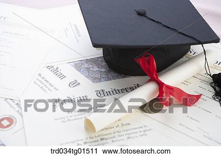 The graduation cap and the diploma View Large Photo Image Stock Image - The graduation cap and the diploma. Fotosearch