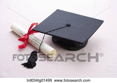 The graduation cap and the diploma View Large Photo Image Stock Photo - The graduation cap and the diploma. Fotosearch