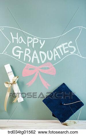 The graduation cap, diploma, and celebrating word View Large Photo Image Stock Image - The graduation cap, diploma, and celebrating word . Fotosearch