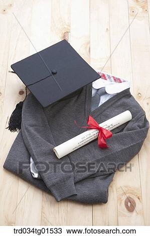 The graduation cap, school uniform, and diploma View Large Photo Image Stock Image - The graduation cap, school uniform, and diploma. Fotosearch