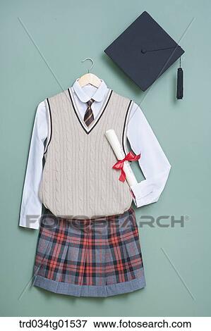 The graduation cap, school uniform, and diploma View Large Photo Image Stock Photo - The graduation cap, school uniform, and diploma. Fotosearch