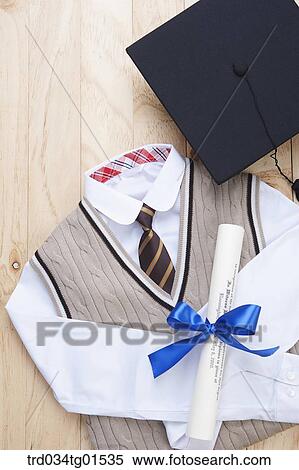 The graduation cap, school uniform, and diploma View Large Photo Image Stock Photography - The graduation cap, school uniform, and diploma. Fotosearch