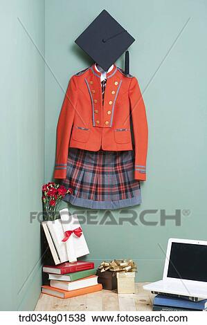 The graduation cap, school uniform, gift, and diploma View Large Photo Image Stock Photo - The graduation cap, school uniform, gift, and diploma. Fotosearch