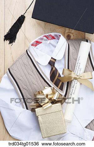 The graduation cap, school uniform, gift, and diploma View Large Photo Image Stock Photograph - The graduation cap, school uniform, gift, and diploma. Fotosearch