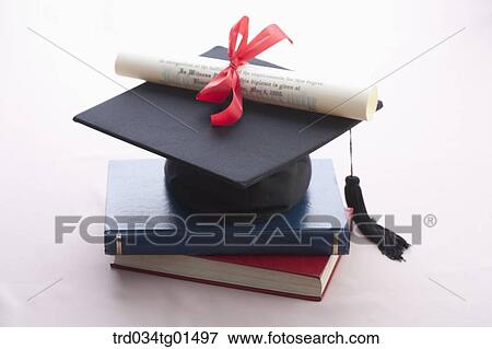 The graduation cap, the diploma, and the books View Large Photo Image Stock Photo - The graduation cap, the diploma, and the books. Fotosearch
