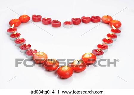 The heart made of red candles View Large Photo Image Stock Image - The heart made of red candles. Fotosearch