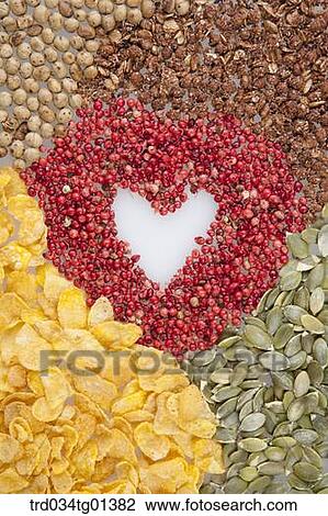 Stock Image - The heart made of the grain . Fotosearch