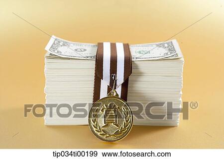 The prize medal and money View Large Photo Image Stock Photo - The prize medal and money. Fotosearch