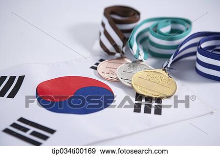 The prize medal on the national flag of South Korea View Large Photo Image Stock Photo - The prize medal on the national flag of South Korea . Fotosearch