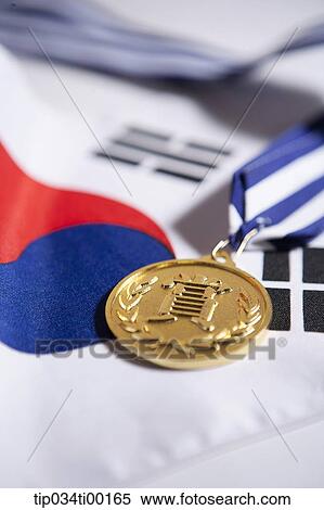 The prize medal on the national flag of South Korea View Large Photo Image Stock Photography - The prize medal on the national flag of South Korea . Fotosearch
