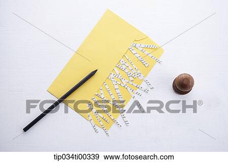 The shredded paper in envelope, pencil, and stamp View Large Photo Image Stock Photo - The shredded paper in envelope, pencil, and stamp. Fotosearch