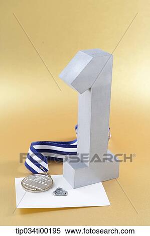 Stock Photography - The silver number one, prize medal, and letter of certificate. Fotosearch