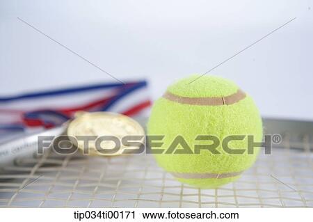 The tennis ball and racket with prize medal View Large Photo Image Stock Image - The tennis ball and racket with prize medal. Fotosearch