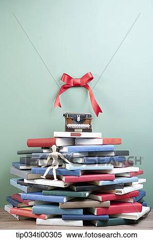 The tine case on the books and the ribbon on the wall View Large Photo Image Stock Photography - The tine case on the books and the ribbon on the wall. Fotosearch