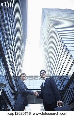 A business man with a briefcase looking in the same direction View Large Photo Image Stock Photograph - A business man with a briefcase looking in the same direction. Fotosearch