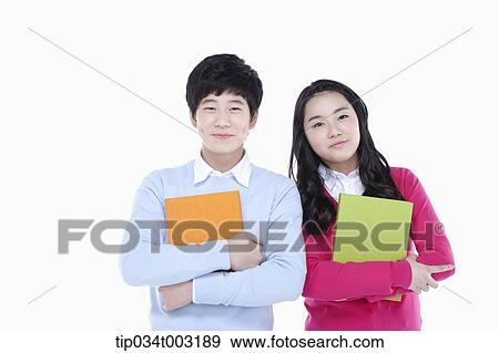 a couple of students holding folders View Large Photo Image Stock Photo - a couple of students holding folders. Fotosearch