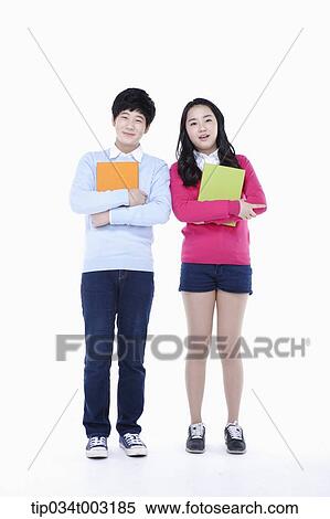 a couple of students holding folders View Large Photo Image Stock Photography - a couple of students holding folders. Fotosearch