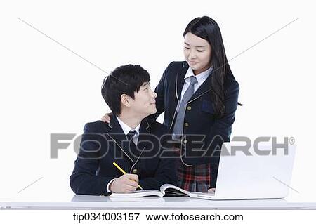 a couple of students looking at each other View Large Photo Image Stock Photo - a couple of students looking at each other. Fotosearch