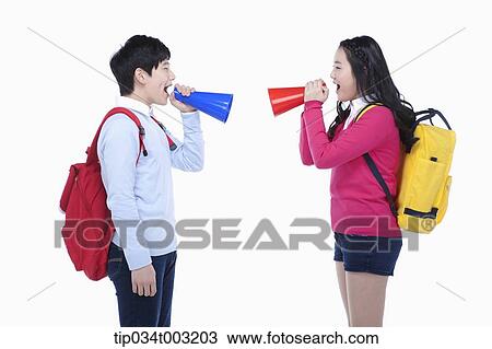 Stock Image - a couple of students speaking through megaphones. Fotosearch
