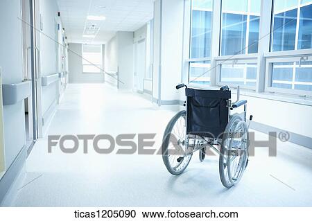 Stock Image - A picture of a wheelchair in an aisle. Fotosearch