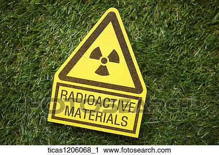 A warning logo of radioactive materials placed on grass View Large Photo Image Stock Image - A warning logo of radioactive materials placed on grass. Fotosearch