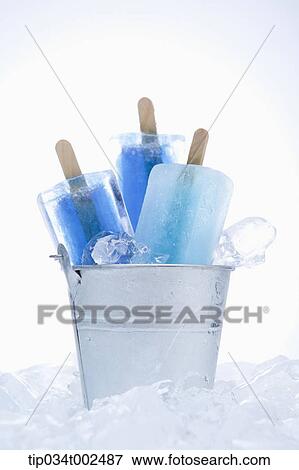 blue ice bars in the bucket View Large Photo Image Stock Photo - blue ice bars in the bucket. Fotosearch