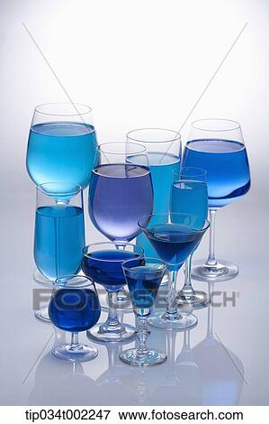 blue liquid in the glasses View Large Photo Image Stock Photo - blue liquid in the glasses. Fotosearch