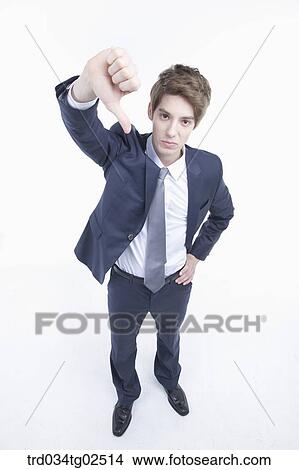 Picture - businessman giving a thumbs-down. Fotosearch