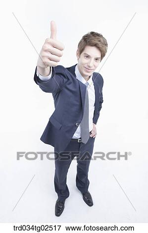 Stock Photo - businessman giving a thumbs-up. Fotosearch