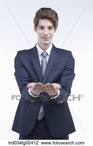 businessman holding out both both hands View Large Photo Image Stock Image - businessman holding out both both hands. Fotosearch